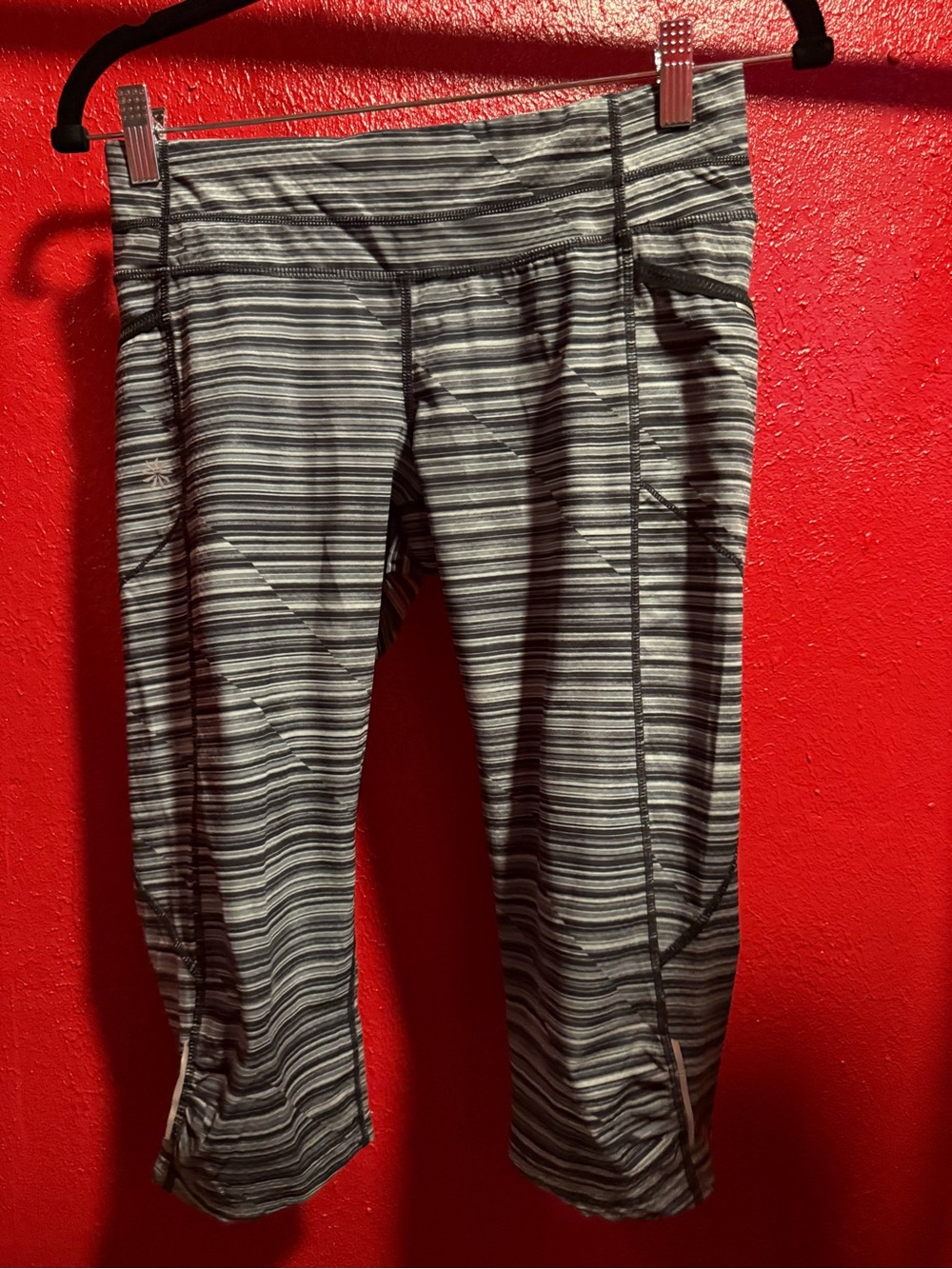 108. Preloved Athleta Gray and Black Striped Crop Leggings